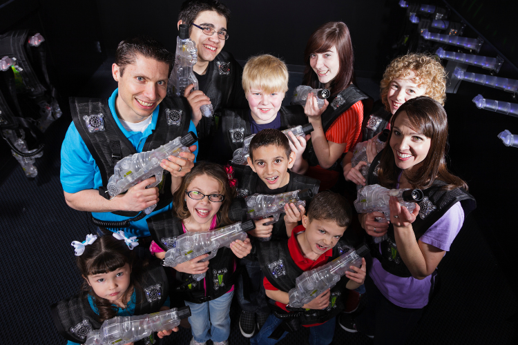 family playing laser tag